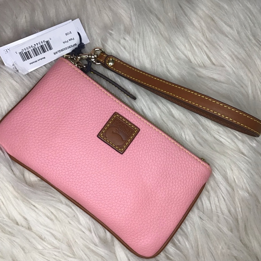 Dooney medium wristlet in pale pink pebble leather